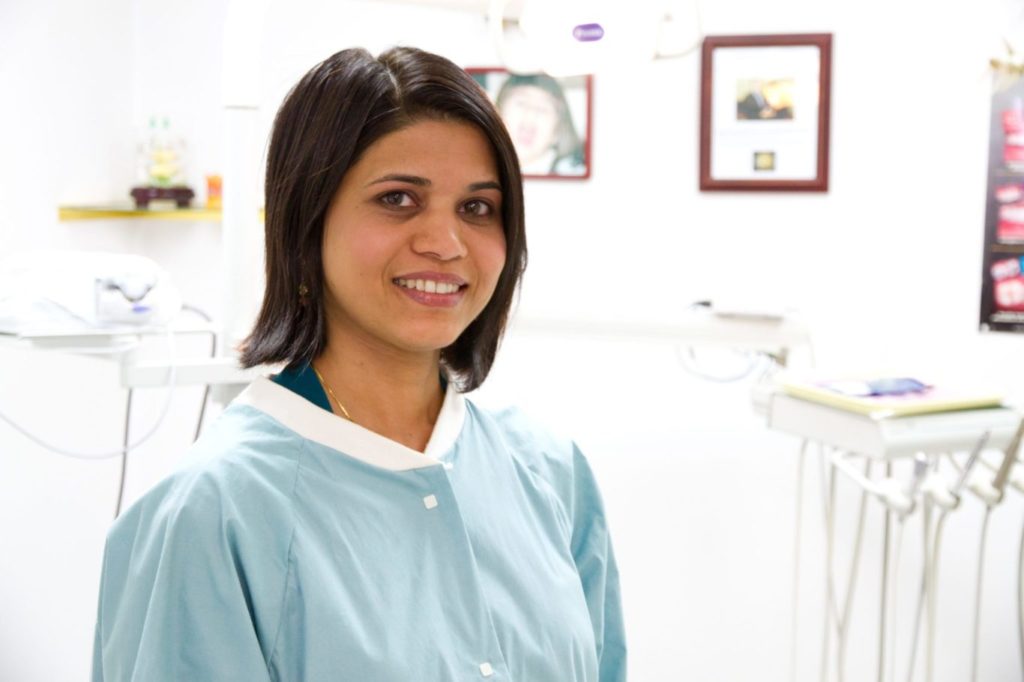 dental hygienist smiling in the office