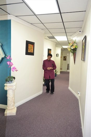 Dr. Pankaj Narkhede standing in his office