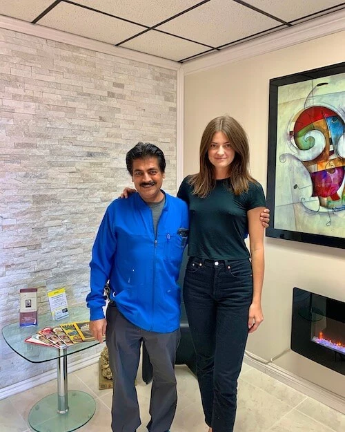 patient smiling with Dr. Narkhede after her air powder teeth cleaning appointment in lake forest, ca